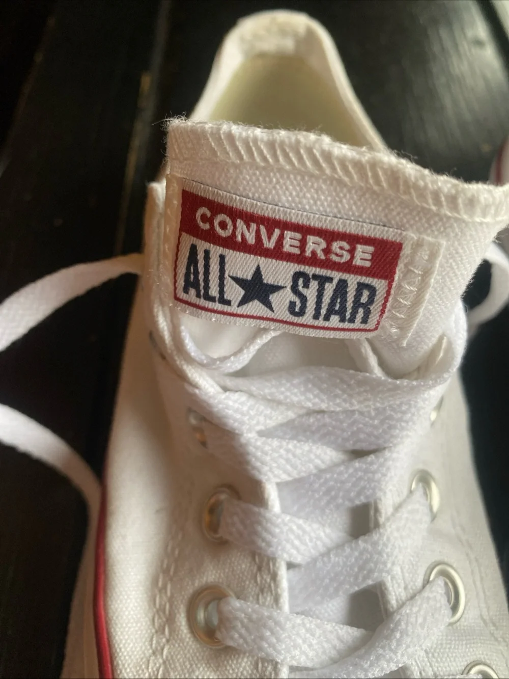 Converse White Low Top Sneakers with Red Trim